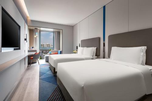 Imagen de la habitación del Hotel Holiday Inn Express Changfeng Park. Foto 16