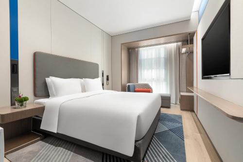 Imagen de la habitación del Hotel Holiday Inn Express Changfeng Park. Foto 18