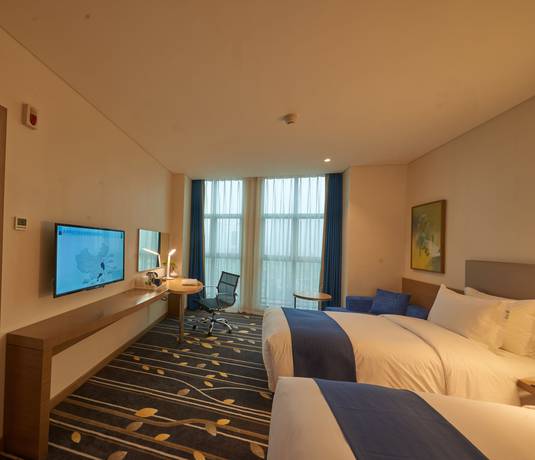 Imagen de los interiores del Hotel Holiday Inn Express Chongqing University Town. Foto 19