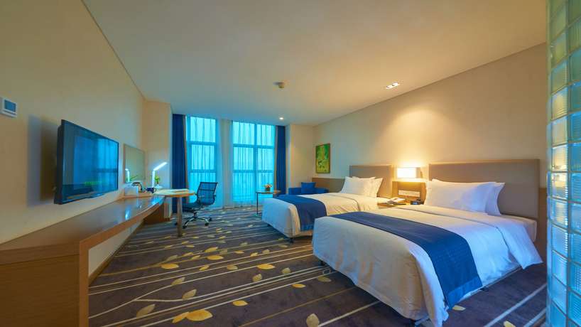 Imagen de la habitación del Hotel Holiday Inn Express Chongqing University Town. Foto 10