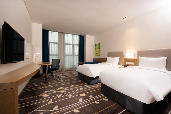 Imagen del bar/restaurante del Hotel Holiday Inn Express Chongqing University Town. Foto 4