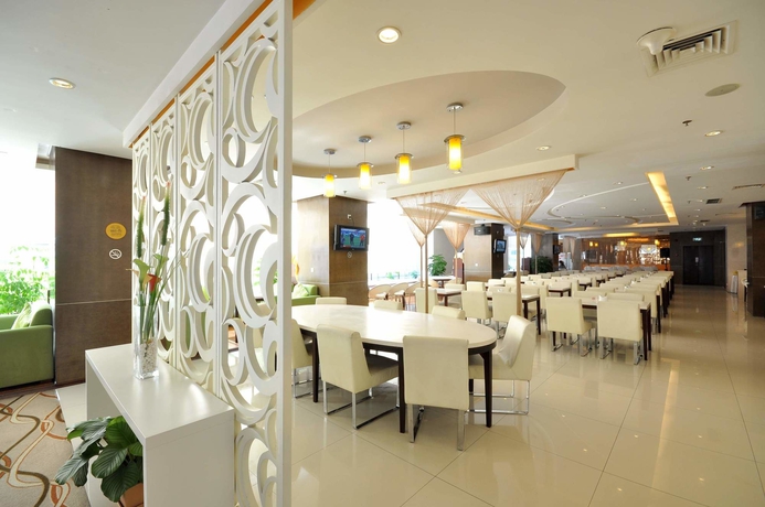 Imagen del bar/restaurante del Hotel Holiday Inn Express Dalian City Centre. Foto 1