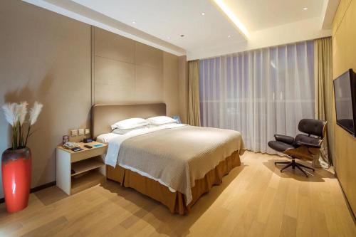 Imagen de la habitación del Hotel Holiday Inn Express Dalian Development Zone. Foto 6