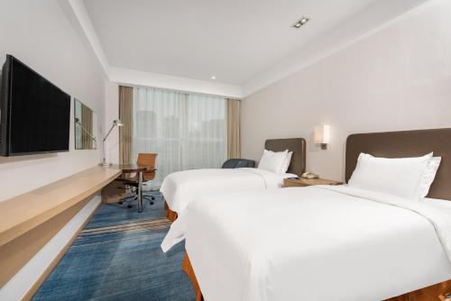 Imagen de la habitación del Hotel Holiday Inn Express Dalian Development Zone. Foto 7
