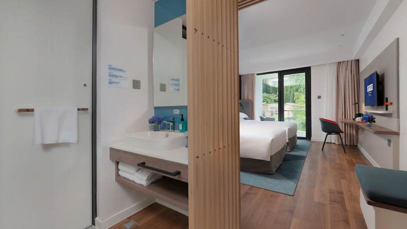 Imagen de la habitación del Hotel Holiday Inn Express E'Mei Qiliping. Foto 10