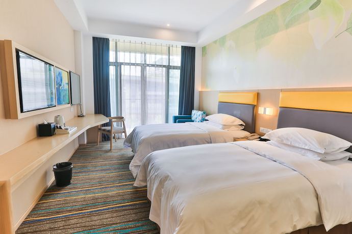 Imagen de la habitación del Hotel Holiday Inn Express Emei Mountain, An Ihg. Foto 3