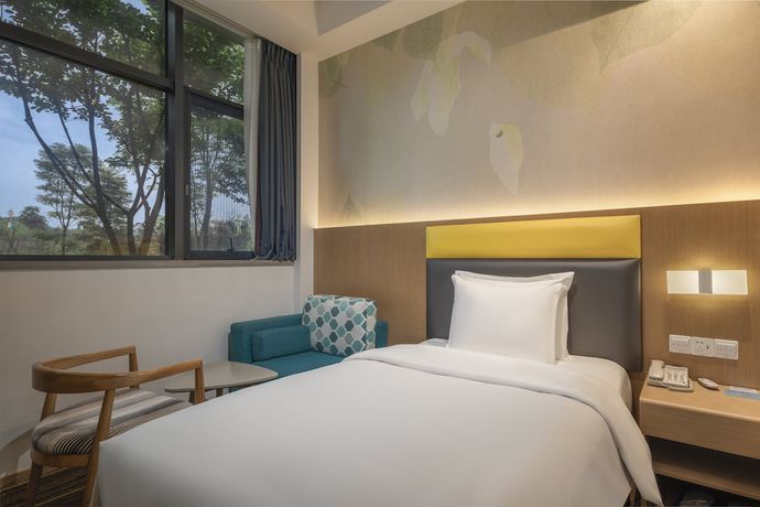 Imagen de la habitación del Hotel Holiday Inn Express Emei Mountain, An Ihg. Foto 5