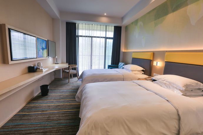 Imagen de la habitación del Hotel Holiday Inn Express Emei Mountain, An Ihg. Foto 6