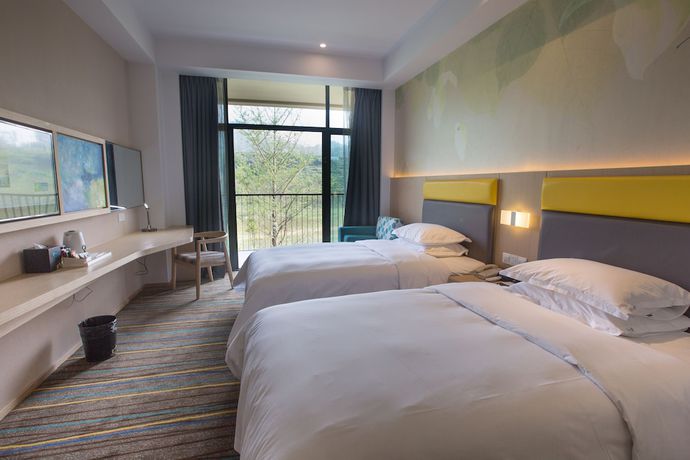 Imagen de la habitación del Hotel Holiday Inn Express Emei Mountain, An Ihg. Foto 7