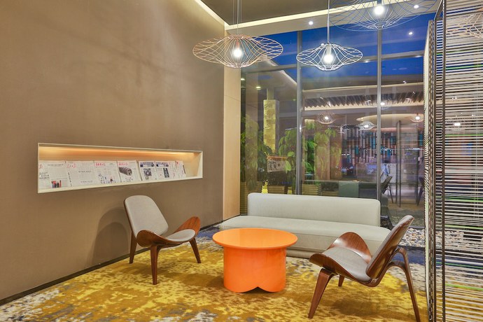 Imagen de los interiores del Hotel Holiday Inn Express Emei Mountain, An Ihg. Foto 19