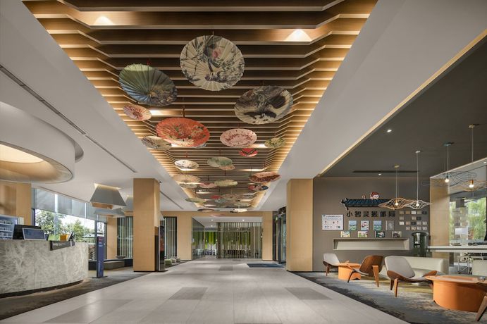 Imagen de los interiores del Hotel Holiday Inn Express Emei Mountain, An Ihg. Foto 20