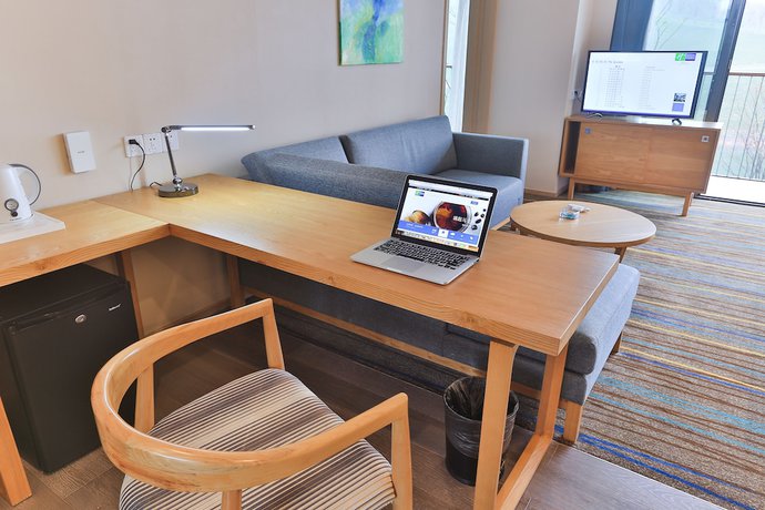 Imagen de la habitación del Hotel Holiday Inn Express Emei Mountain, An Ihg. Foto 14