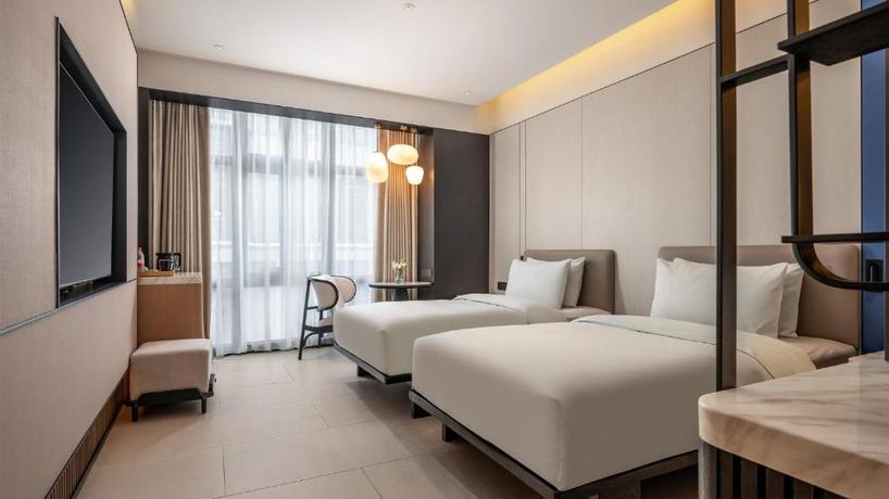 Imagen de la habitación del Hotel Holiday Inn Express Guangzhou Baiyun Airport T2 by IHG. Foto 4