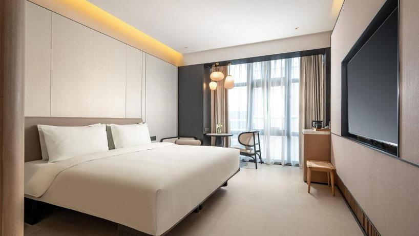 Imagen de la habitación del Hotel Holiday Inn Express Guangzhou Baiyun Airport T2 by IHG. Foto 5
