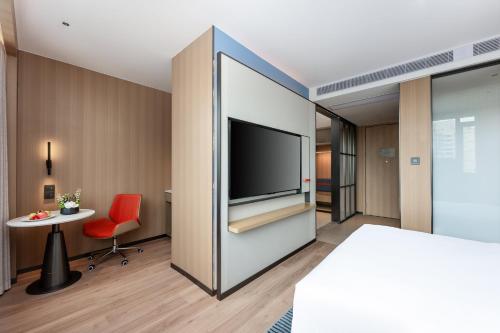 Imagen de la habitación del Hotel Holiday Inn Express Haikou World Trade Center by IHG. Foto 15