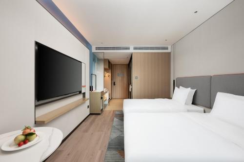 Imagen de la habitación del Hotel Holiday Inn Express Haikou World Trade Center by IHG. Foto 16
