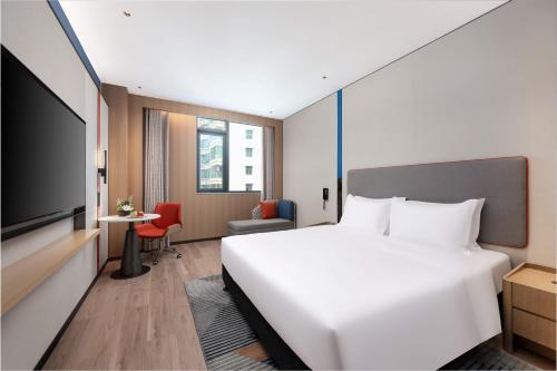 Imagen de la habitación del Hotel Holiday Inn Express Haikou World Trade Center by IHG. Foto 18