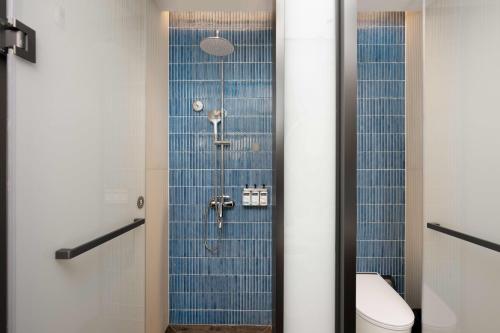 Imagen de la habitación del Hotel Holiday Inn Express Haikou World Trade Center by IHG. Foto 20