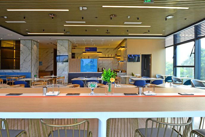 Imagen del bar/restaurante del Hotel Holiday Inn Express Hangzhou Binjiang, An Ihg. Foto 8