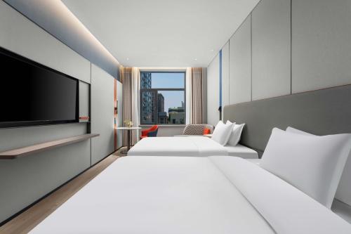 Imagen de la habitación del Hotel Holiday Inn Express Harbin Central Avenue, an IHG. Foto 17