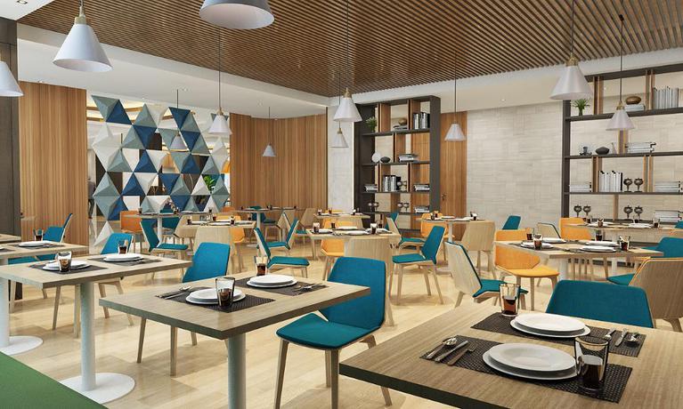 Imagen del bar/restaurante del Hotel Holiday Inn Express Harbin Songbei New District, An Ihg. Foto 4