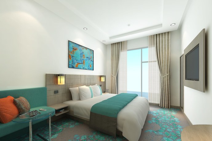 Imagen de la habitación del Hotel Holiday Inn Express Kolkata Airport, an IHG. Foto 10