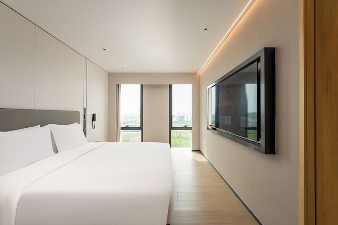 Imagen de la habitación del Hotel Holiday Inn Express Kunshan Yushan by IHG. Foto 16