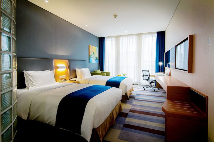 Imagen del bar/restaurante del Hotel Holiday Inn Express Leshan City Square, An Ihg. Foto 3