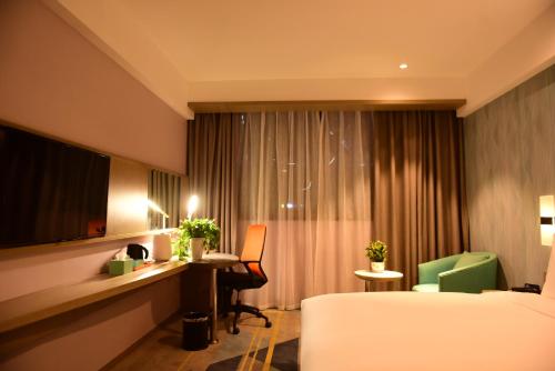 Imagen de la habitación del Hotel Holiday Inn Express Lhasa Potala Square. Foto 4
