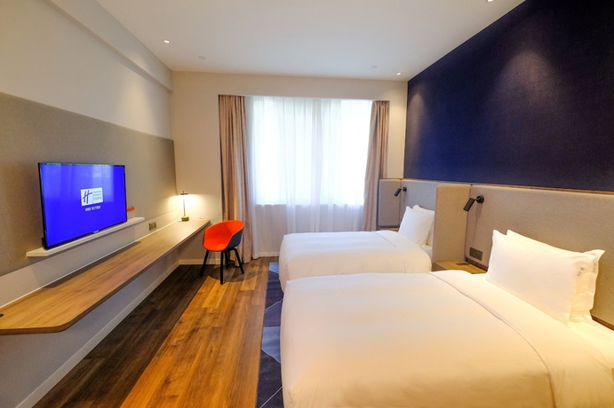 Imagen de la habitación del Hotel Holiday Inn Express Lishui City Center. Foto 11