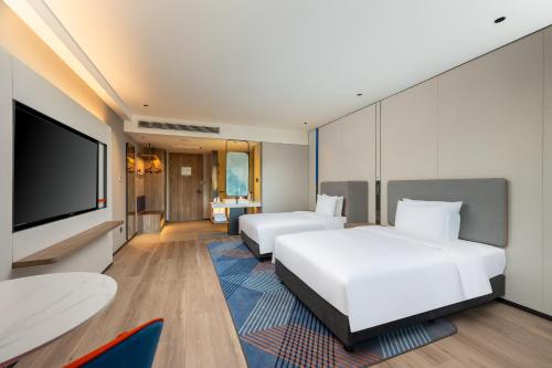 Imagen de la habitación del Hotel Holiday Inn Express Luoyang Longmen, an IHG. Foto 18