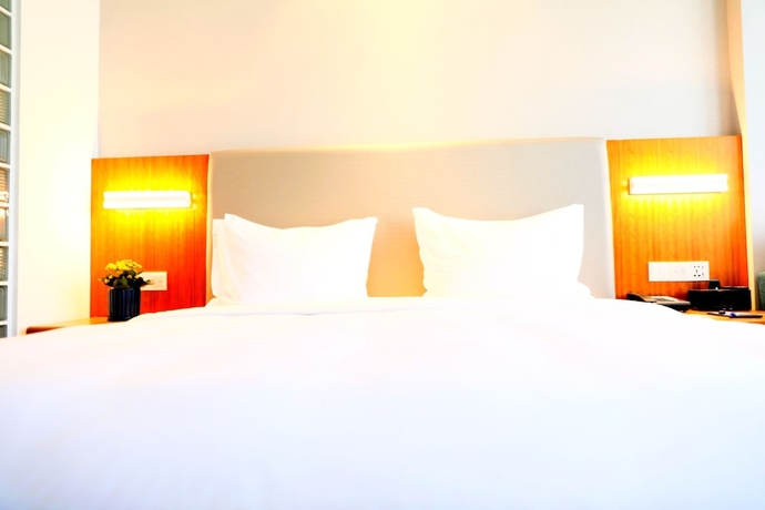 Imagen de la habitación del Hotel Holiday Inn Express Luoyang Xiyuan. Foto 11