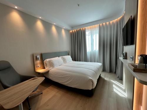 Imagen de la habitación del Hotel Holiday Inn Express - Madrid - Airport, an IHG. Foto 8
