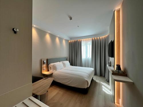 Imagen de la habitación del Hotel Holiday Inn Express - Madrid - Airport, an IHG. Foto 11