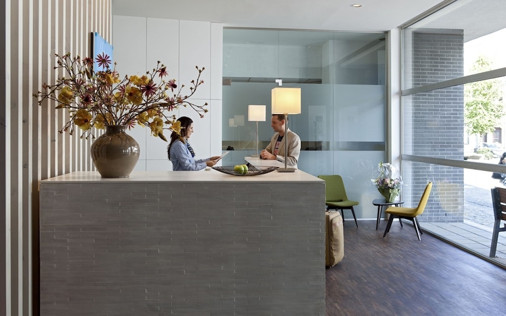 Imagen de los interiores del Hotel Holiday Inn Express Malinas Centro. Foto 16