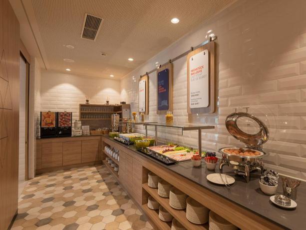 Imagen del bar/restaurante del Hotel Holiday Inn Express Munich - City East, an IHG Hotel. Foto 3