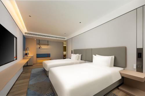 Imagen de la habitación del Hotel Holiday Inn Express Nanjing Riverside, an IHG. Foto 11