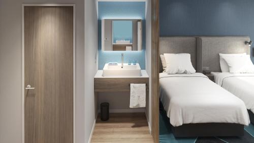 Imagen de la habitación del Hotel Holiday Inn Express Nanning Convention&Exhibition. Foto 6