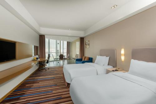 Imagen de la habitación del Hotel Holiday Inn Express Nantong Downtown. Foto 5