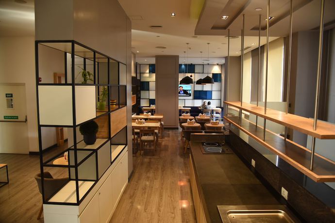 Imagen del bar/restaurante del Hotel Holiday Inn Express Nashik Indira Nagar, An Ihg. Foto 2