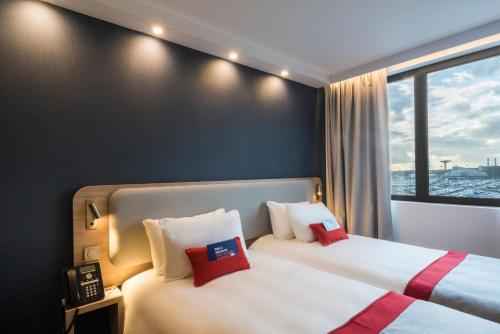 Imagen de la habitación del Hotel Holiday Inn Express París - Aeropuerto CDG. Foto 4