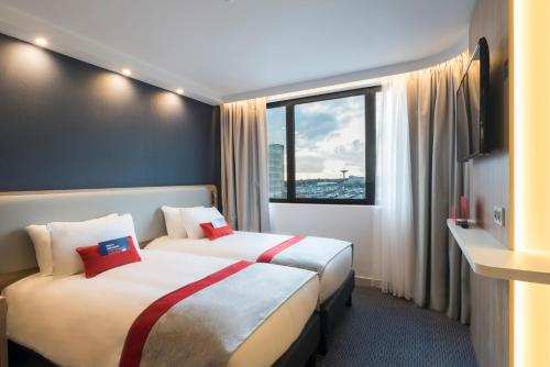 Imagen de la habitación del Hotel Holiday Inn Express París - Aeropuerto CDG. Foto 7