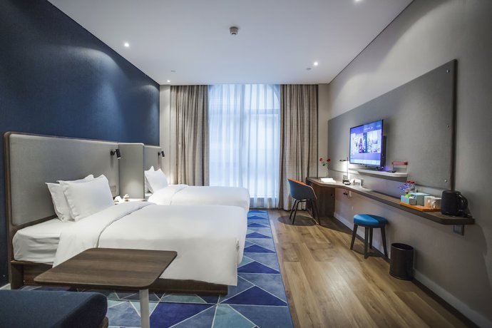 Imagen de la habitación del Hotel Holiday Inn Express Pudong Chuansha. Foto 6