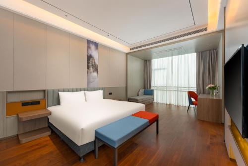Imagen de la habitación del Hotel Holiday Inn Express Qidong Economic Zone, an IHG. Foto 14