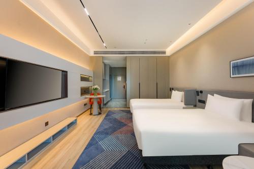 Imagen de la habitación del Hotel Holiday Inn Express Qidong Economic Zone, an IHG. Foto 17