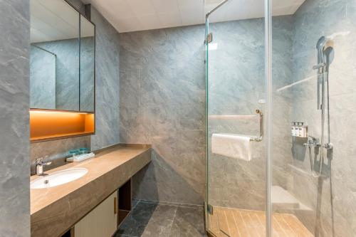 Imagen de la habitación del Hotel Holiday Inn Express Qidong Economic Zone, an IHG. Foto 18