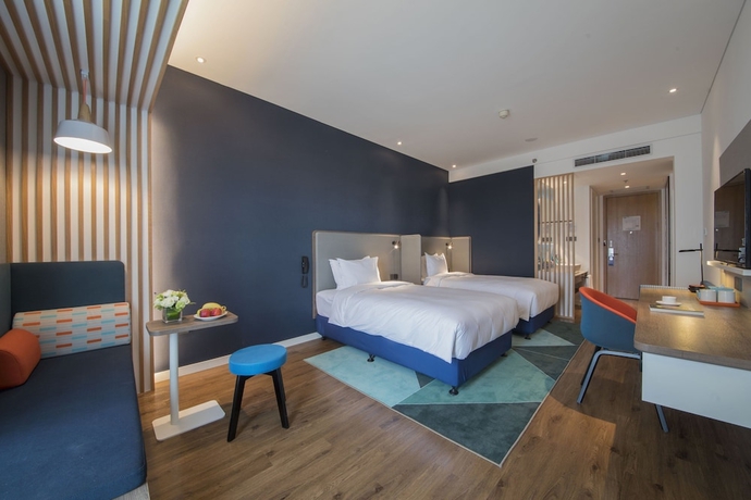 Imagen de la habitación del Hotel Holiday Inn Express Qingdao Chengyang Central. Foto 6