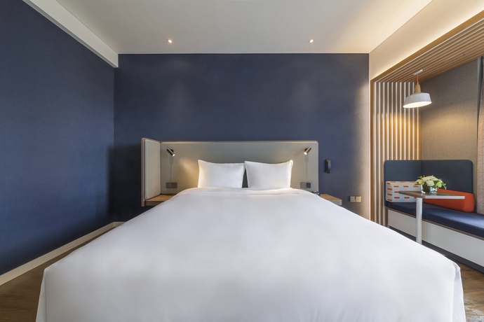 Imagen de la habitación del Hotel Holiday Inn Express Qingdao Chengyang Central. Foto 8