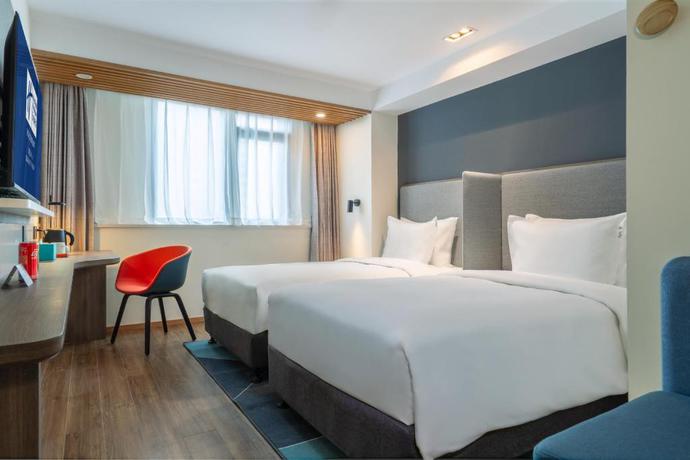 Imagen general del Hotel Holiday Inn Express Qingdao City Center. Foto 30