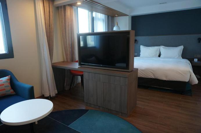 Imagen general del Hotel Holiday Inn Express Qingdao City Center. Foto 32